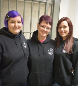 Crystal (centre) with her daughters Emily (left) and Jamie (right).