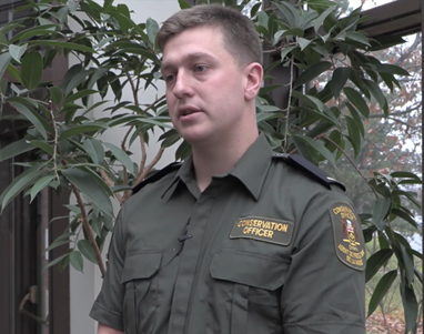 Photo of Aaron Zuwala, a Conservation Officer and Fleming graduate