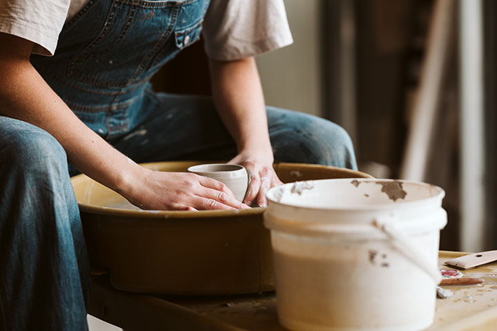An artist making a ceramic bowl