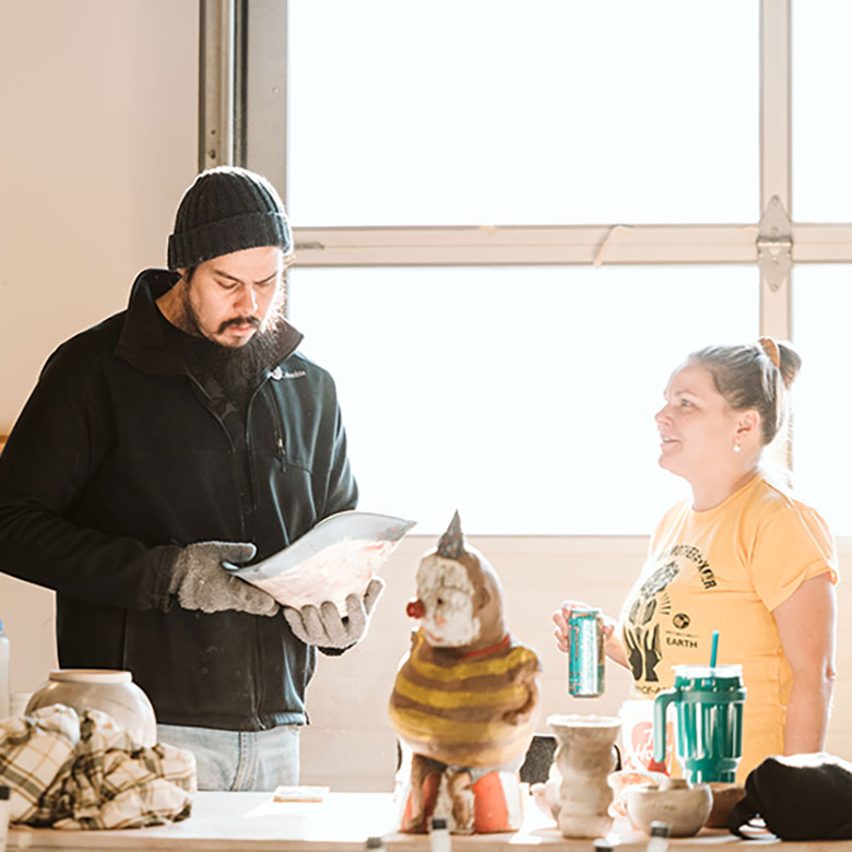 an image of the a student watching an instructor demonstration 1 to 1